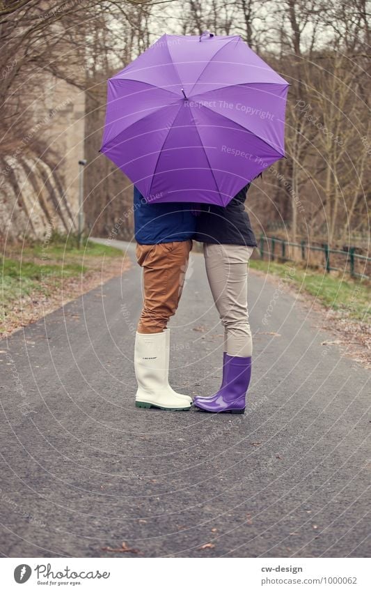 Couple in love behind umbrella Love Lovers Umbrella Sunshade Emotions together togetherness Man Woman Relationship Together Happy Infatuation Harmonious