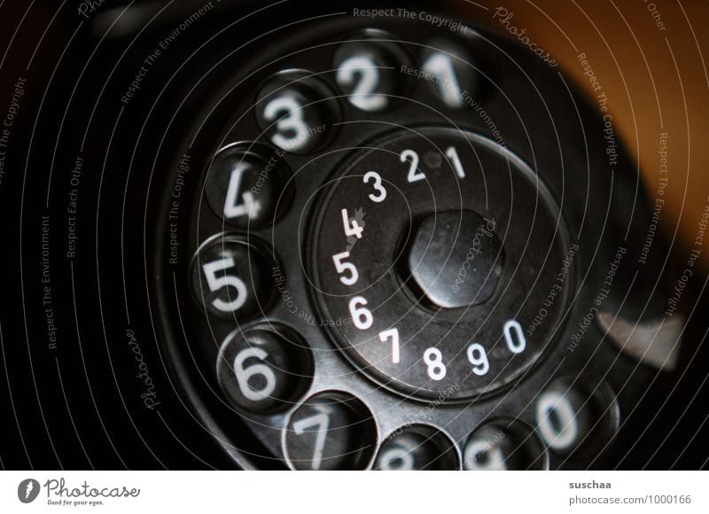 1 2 3 4 5 6 7 ... Plastic Digits and numbers Dark Retro Black Telephone Rotary dial Old Round bakelite Colour photo Subdued colour Interior shot Close-up