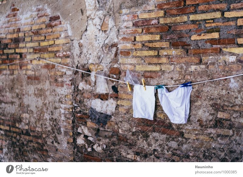 fresh laundry Vacation & Travel City trip Summer vacation Brick wall Sicily Italy Village Old town Wall (barrier) Wall (building) Facade Clothing Underwear
