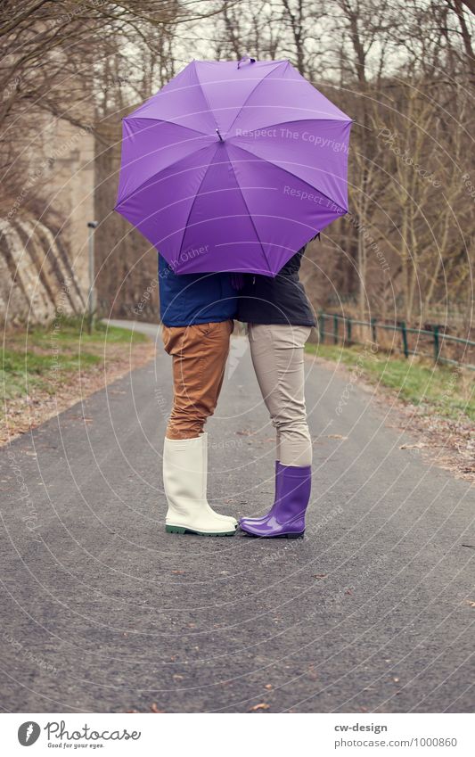 Couple in love hiding behind umbrella Lanes & trails Bridge Human being Harmonious Man Display of affection Romance Emotions Affection Woman Lovers Infatuation