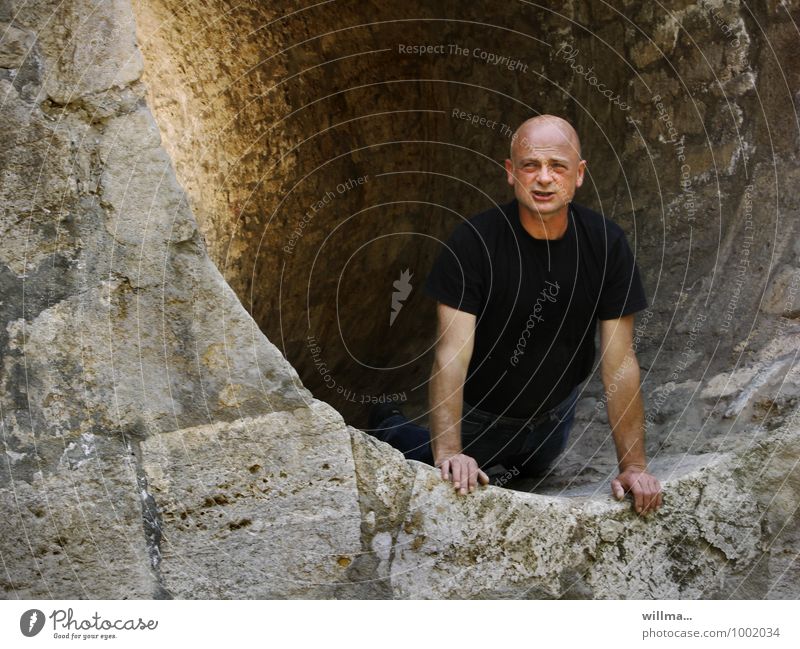 Bald man looking out of a tunnel Freedom Expedition Man Adults Human being 30 - 45 years 45 - 60 years Bridge Tunnel Bald or shaved head Looking Hope Belief