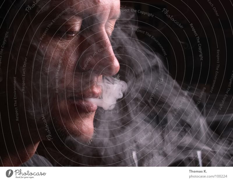 smoke Portrait photograph Cigarette Lighter Hand Illness Bans Ignite Blaze Tobacco products Pulmonary disease Black Eyeglasses Lung Gullet Larynx Smoking Cancer