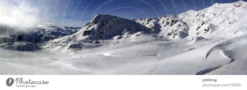 mountain panorama Mountain range Panorama (View) Skis Peak Cold Austria Federal State of Tyrol Winter Europe Snow Ski run Alps Large Panorama (Format)