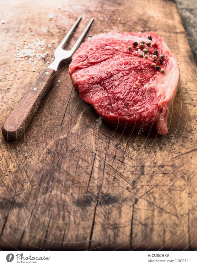 Raw roast beef with meat fork, salt and pepper Food Meat Nutrition Lunch Dinner Organic produce Diet Fork Style Design Healthy Eating Kitchen raw striploin