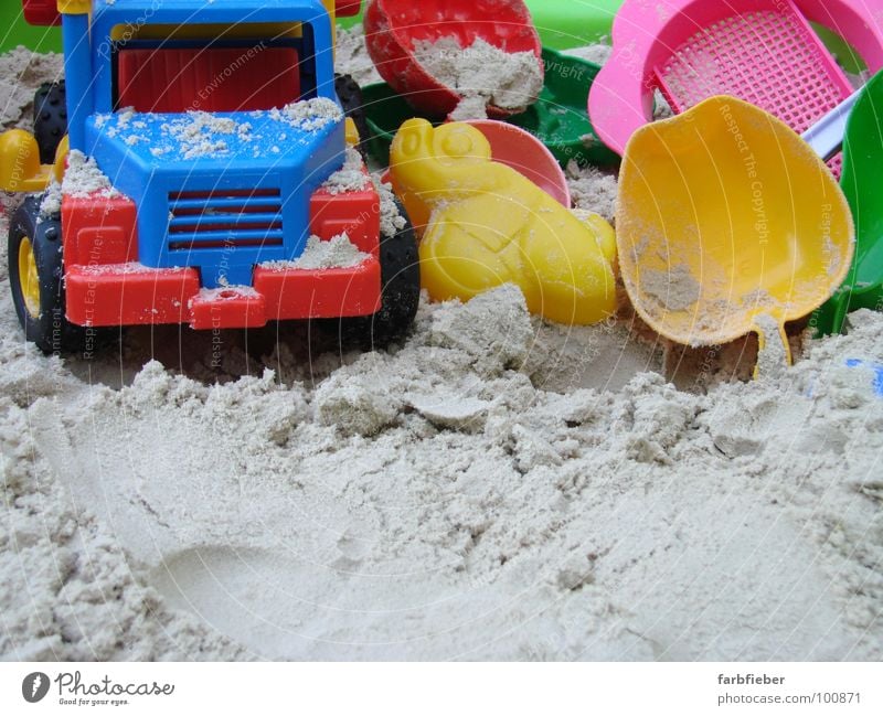 Played out Playing Summer Summer vacation Kindergarten Construction site Infancy Sand Car Truck Plastic Build Blue Multicoloured Yellow Red Stagnating Sandpit