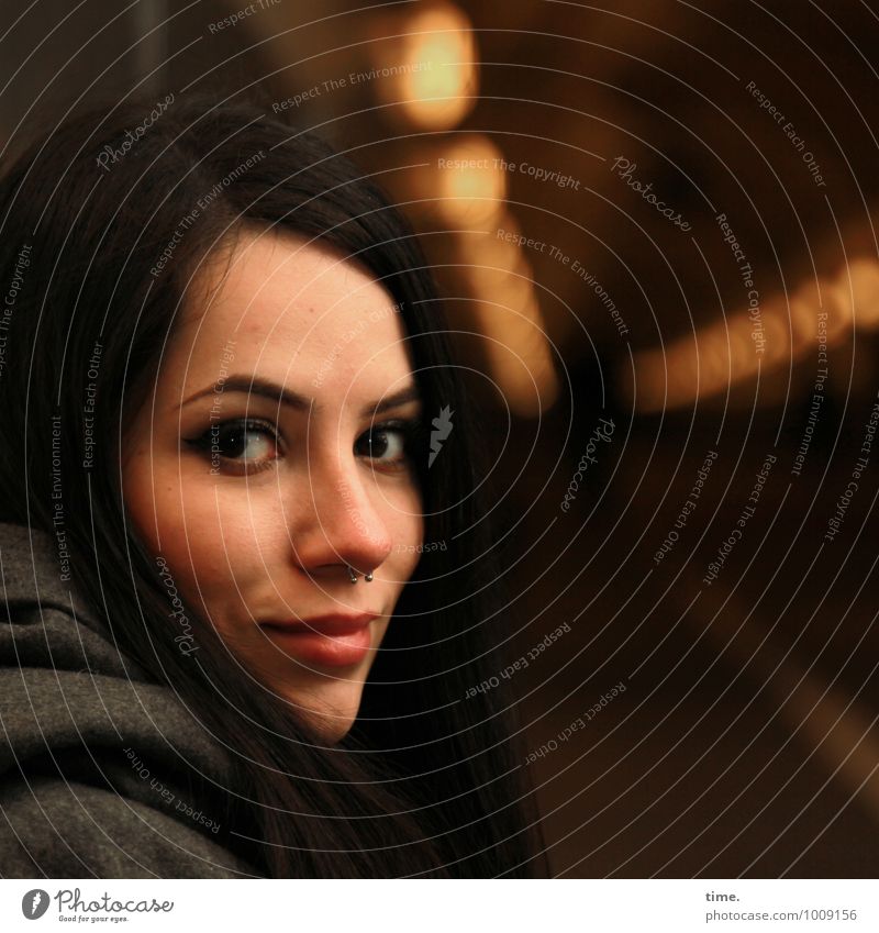 Woman in Elbtunnel Feminine Young woman Youth (Young adults) 1 Human being Coat Piercing Black-haired Long-haired Observe Smiling Looking Esthetic pretty Town