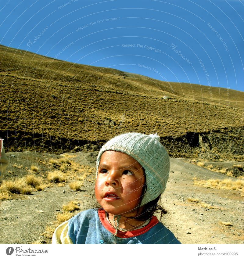 Bolivia Child Girl Cap Cold Dirty Grief South America Small Square Sweet Brave Girlish Third World Development Growth Disaster Arm Street Happy Sadness Mountain