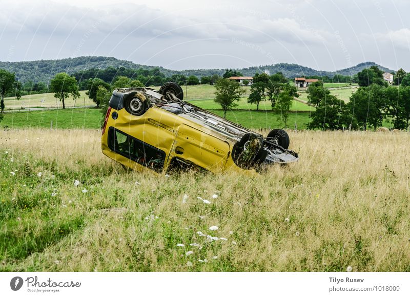 Car accident Meadow Small Yellow Flip over Crushed Damage Spain Navarra Valley Accident Condition Broken Junk Colour photo Deserted Evening Front view