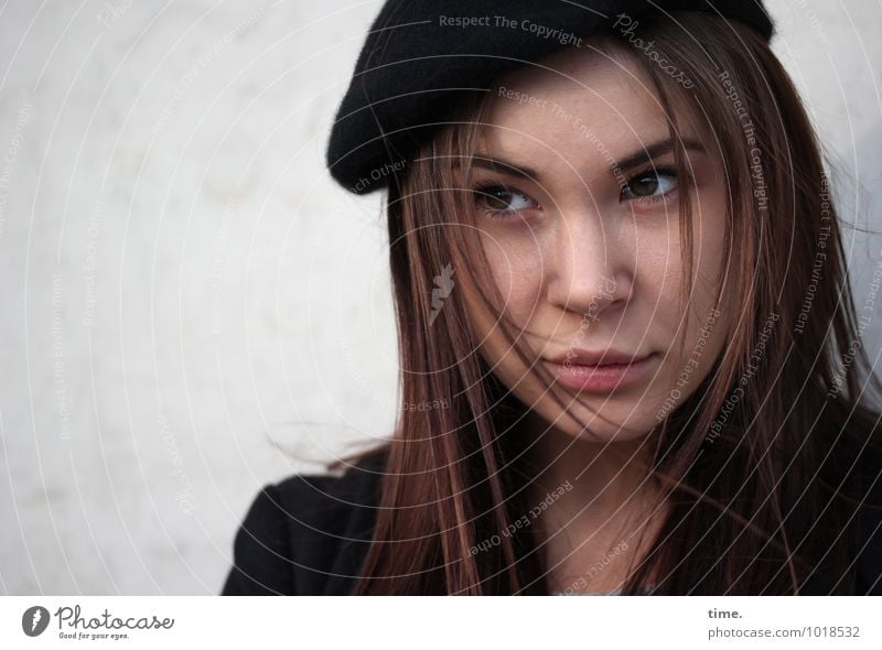 Yuliya Feminine Young woman Youth (Young adults) 1 Human being Wall (barrier) Wall (building) Jacket Hat Brunette Long-haired Observe Think Looking Wait