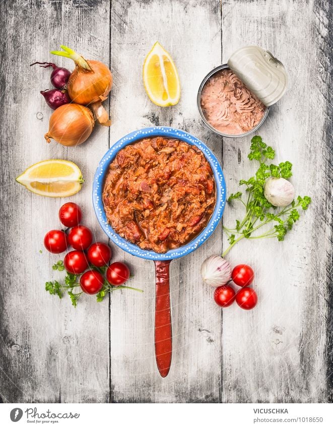 Tomato sauce with tuna fish and ingredients Food Fish Vegetable Herbs and spices Cooking oil Nutrition Lunch Banquet Organic produce Vegetarian diet Diet