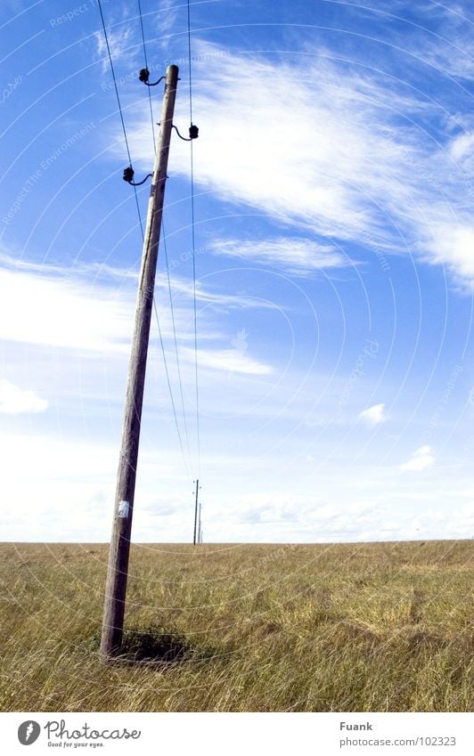 Electricity over land Electricity pylon Field Far-off places Clouds Summer Americas Sky Bright Graffiti Tilt