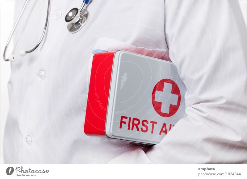 Doctor with first aid kit box under his arm Health care Tool Man Adults 1 Human being Coat Work and employment Carrying Red White consultant practitioner