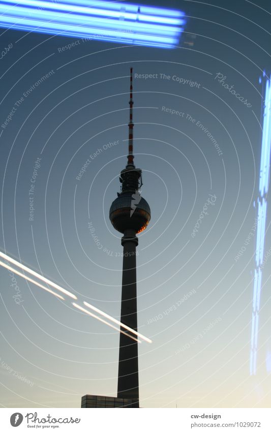 Television tower with reflection of fluorescent tubes from Saturn Reflection sights Town Tourist Attraction Capital city Monument Sky Downtown Berlin Tower