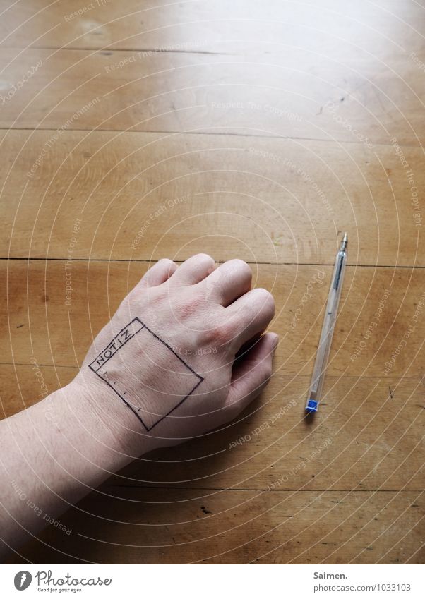 memento Hand Fingers Write Uniqueness Help Innovative Arrangement oblivious Pen Ballpoint pen Piece of paper Remember Table Tattoo Tattooed Colour photo