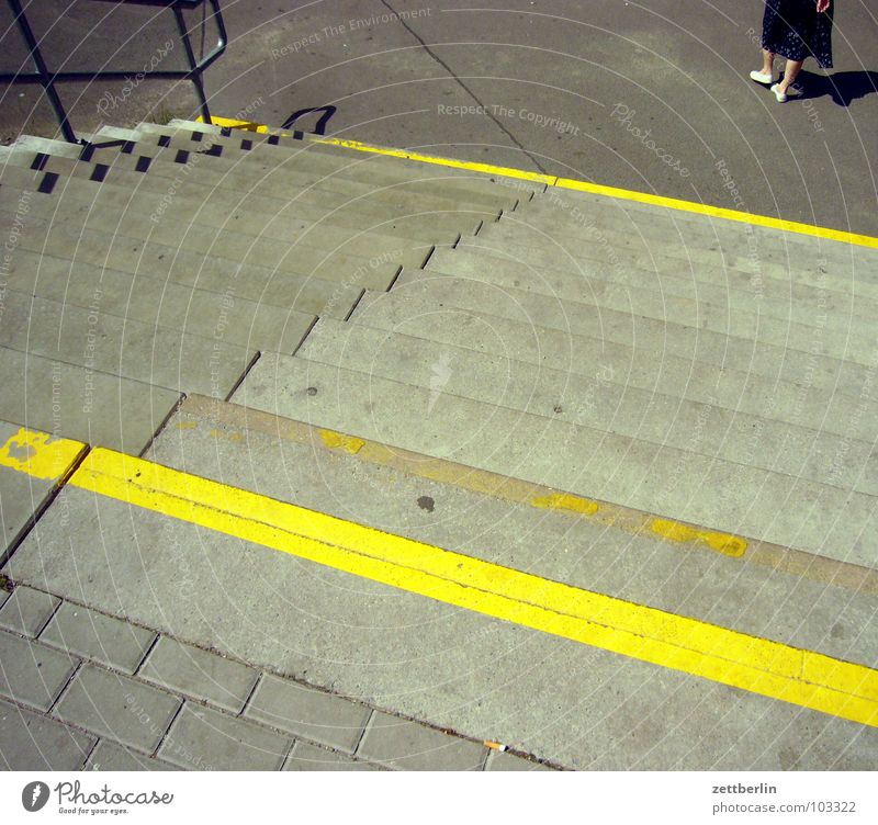 staircase Yellow Stripe Calf Downward Upward Go up Descent Ascending Level Story Access Bright yellow Seam Detail Woman Stairs Feet Difference Train station