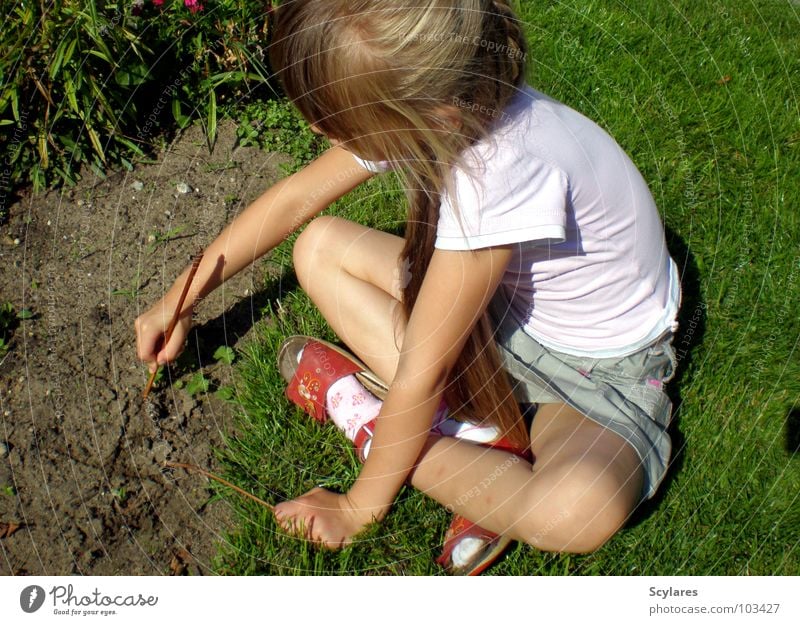 Deepened in creativity Girl Stick Child Summer Long-haired Blonde Write Sand Lawn Draw Twig Sit hollowed Creativity