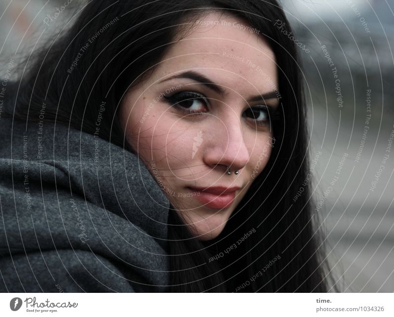 . Feminine Young woman Youth (Young adults) 1 Human being Coat Piercing Black-haired Long-haired Observe Smiling Looking Wait Exceptional Beautiful Contentment