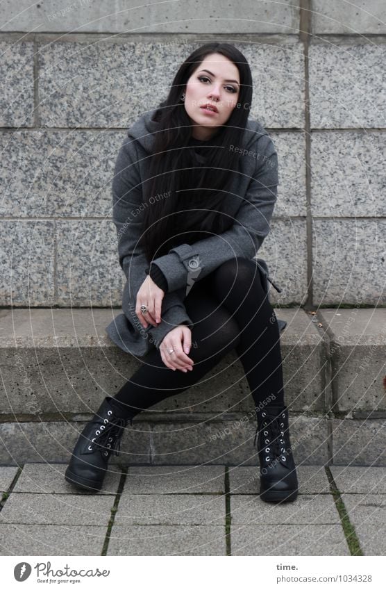 . Feminine Young woman Youth (Young adults) 1 Human being Wall (barrier) Wall (building) Stairs Coat Footwear Black-haired Long-haired Observe Looking Sit Wait