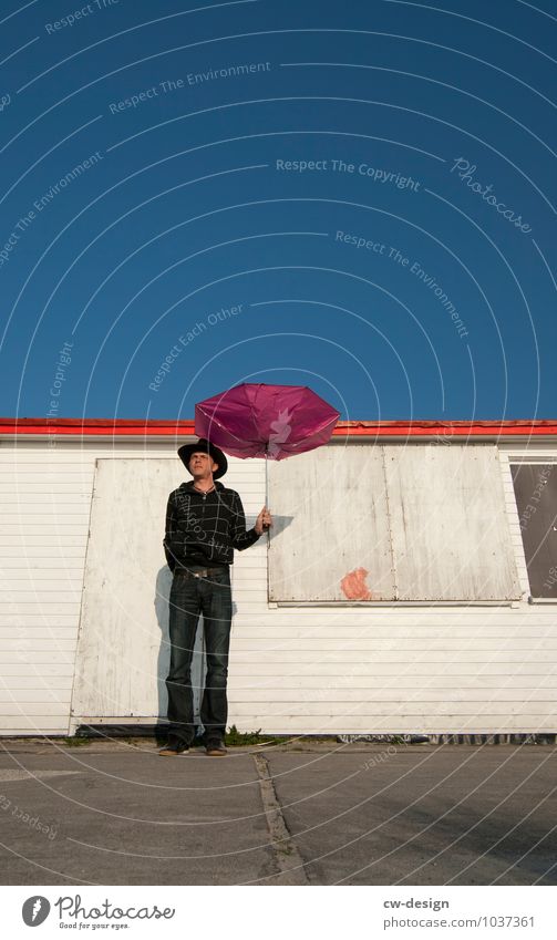 Man with umbrella Lifestyle Elegant Style Joy Human being Masculine Young man Youth (Young adults) Adults 1 18 - 30 years Youth culture Fishing village Hut