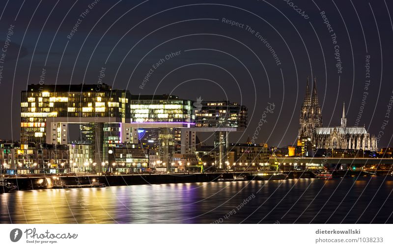 crane buildings Skyline Church Dome Cologne Cologne Cathedral Colour photo Exterior shot Evening Twilight Kranhäuser Water reflection Bright Colours Night shot