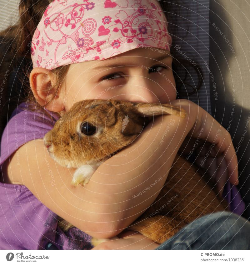 Girl cuddles with rabbit Feminine Child Infancy 1 Human being 3 - 8 years Headwear Headscarf Pet Hare & Rabbit & Bunny Animal Touch Kissing Love Sit Cute Happy
