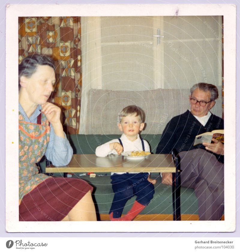 colors of 69 Grandmother Grandfather Family & Relations Former Child Boy (child) Together Meal Grandchildren Nostalgia Idyll Living room Snapshot Only child