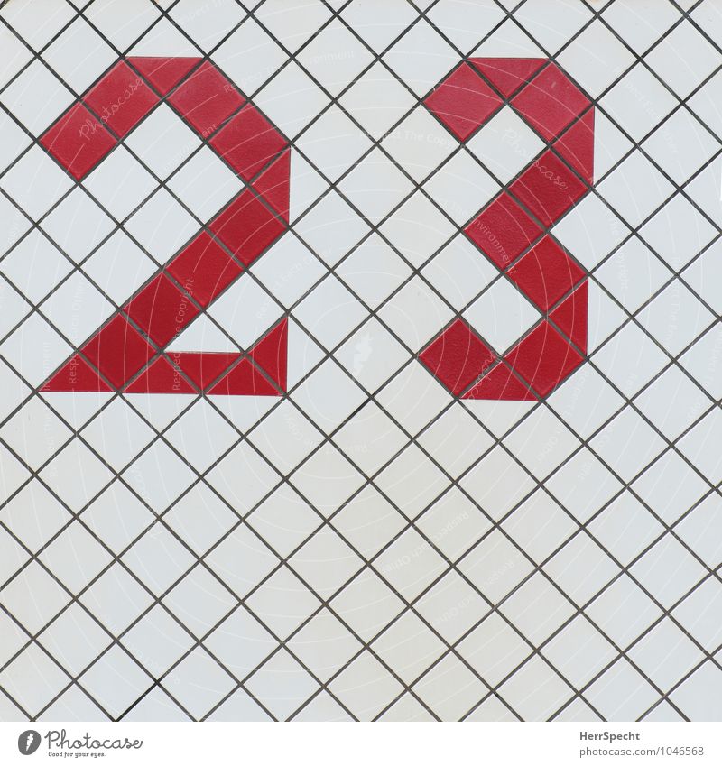 23 Manmade structures Wall (barrier) Wall (building) Digits and numbers Esthetic Cool (slang) Sharp-edged Retro Red White Mosaic Tile House number Colour photo