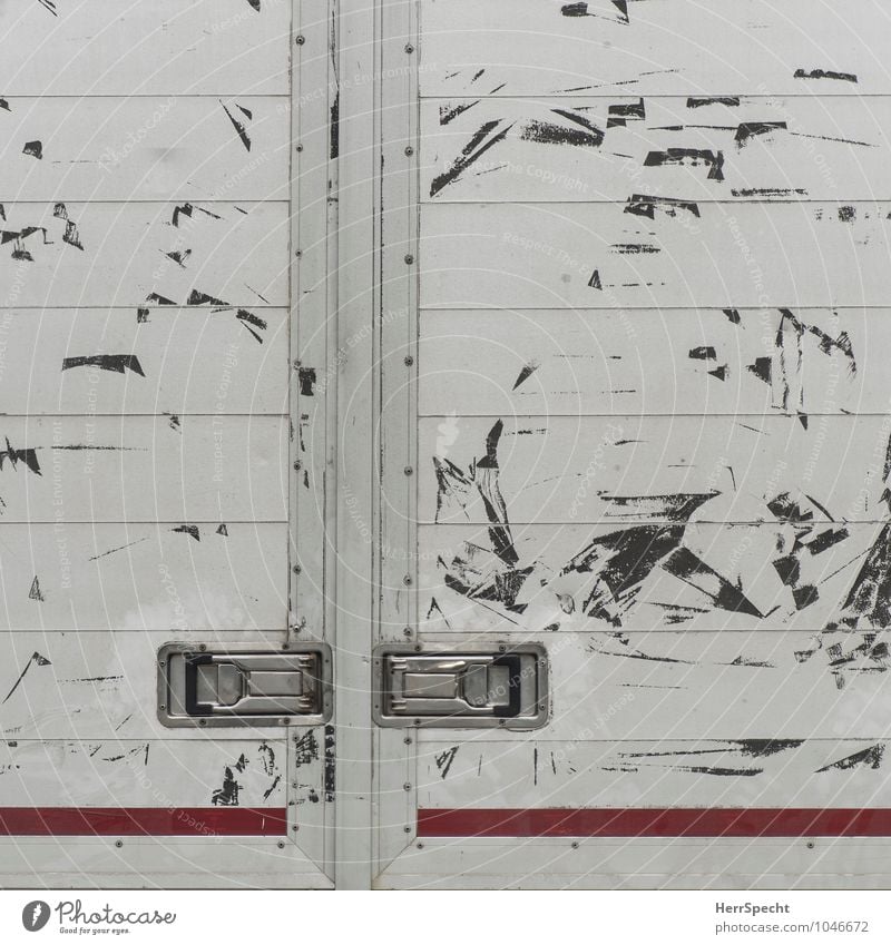 scuffs Vehicle Truck Metal Gray Silver Flap Car door Door handle Closed tailgate Cargo hold Tracks Scratch mark Abrasion Scrape Logistics Colour photo
