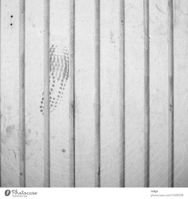 Garage door (jammed) Wall (barrier) Wall (building) Facade Gate Metal Sign Footprint Line Stripe Imprint Dirty Hideous Gloomy Gray Emotions Anger Aggravation