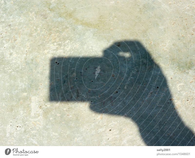 clipping Camera Hand Fingers Small Take a photo Release Stone floor Shadow play To hold on Silhouette Sharp-edged Colour photo Exterior shot Deserted Day