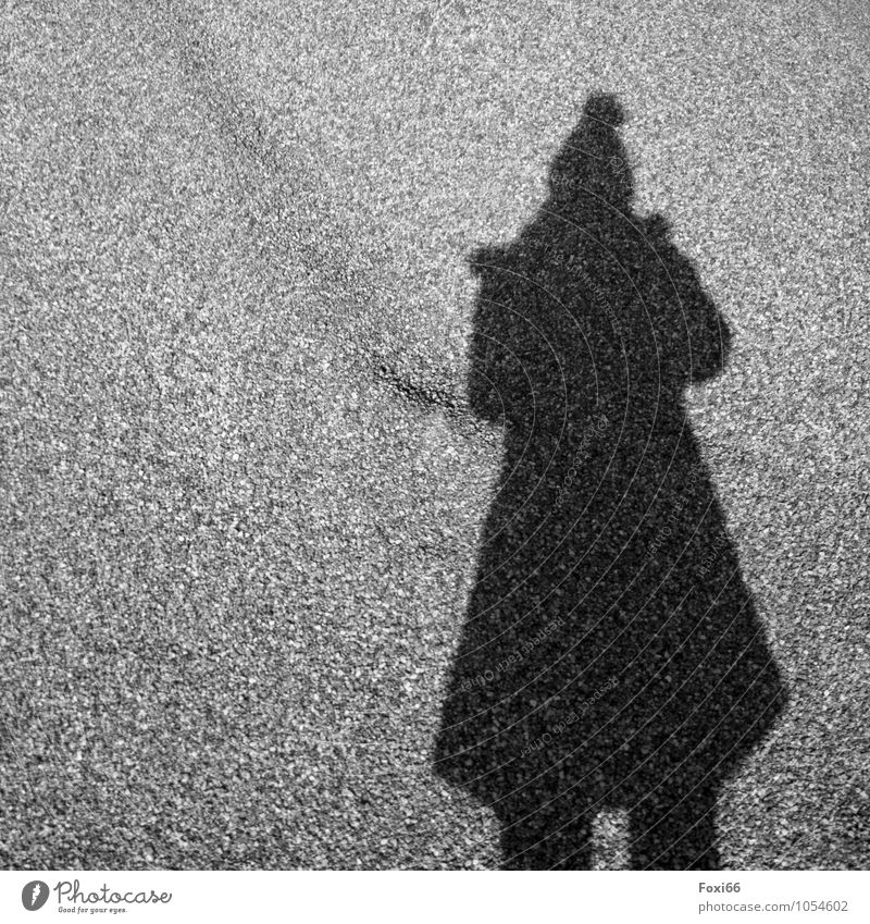 fallen out of time / shadow plays Human being 1 Stage Culture Shadow play Coat Cloth Cap Bobble hat Black White Calm Mysterious Idea Inspiration Perspective