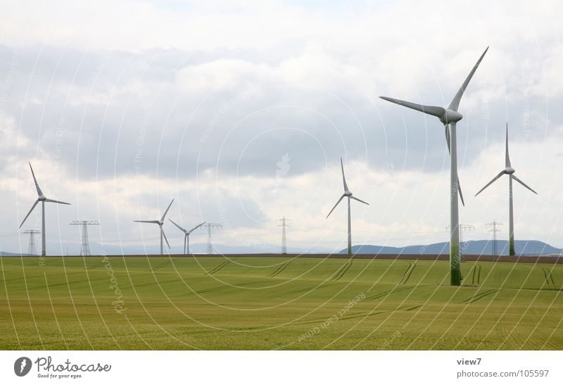 wind power Energy industry Renewable energy Wind energy plant Industry Sky Clouds Grass Meadow Field Free Large Tall Long Speed Yellow Green Power Success