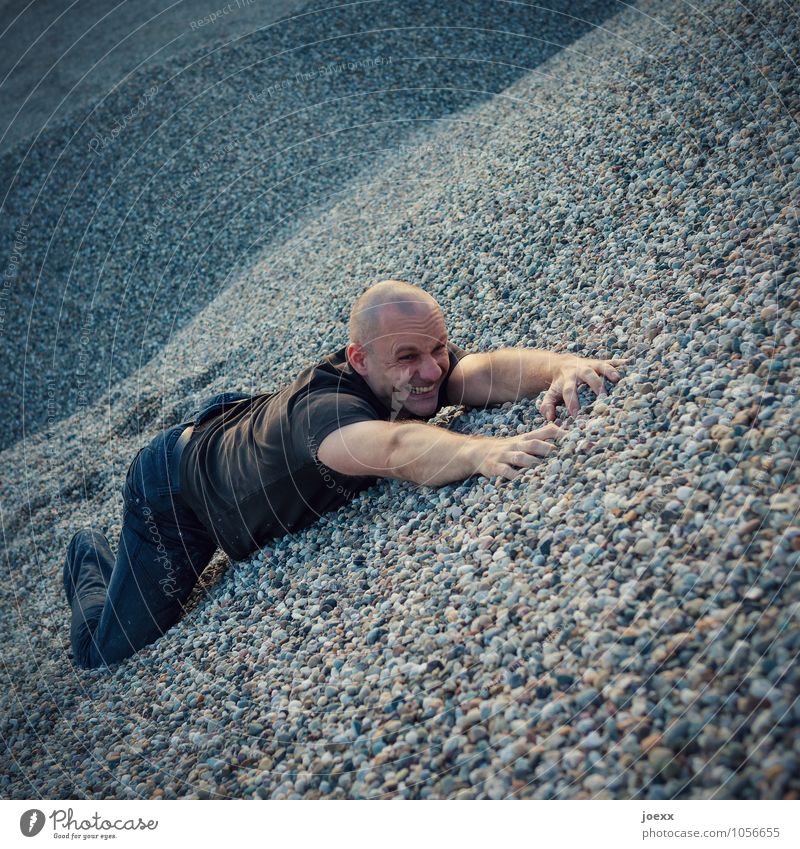 Gravel! Masculine Man Adults Body Face 1 Human being Hill Stone Hang Fight Lie Tall Emotions Power Willpower Brave Distress Avaricious Lack of inhibition Stress