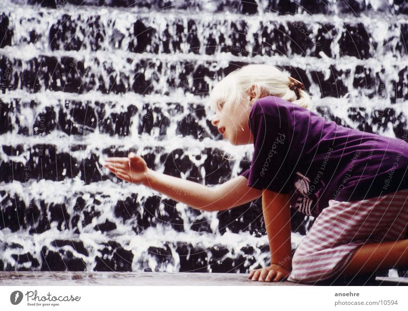 Girl at the fountain Well Playing Child Water