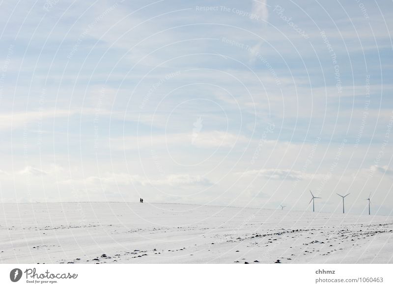 headwind 2 Human being Hiking Blue White Loneliness Far-off places Winter Wind energy plant Energy industry To go for a walk Snow icily Clouds Sky Field Flat
