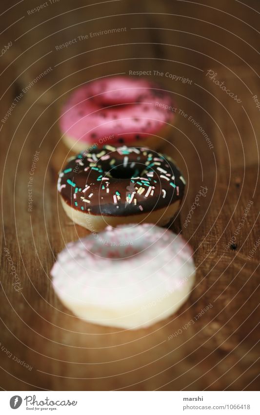 doughnuts Food Dessert Candy Nutrition Eating Moody Donut Calorie Rich in calories 3 Granules Chocolate Wooden table glaze Colour photo Interior shot Close-up