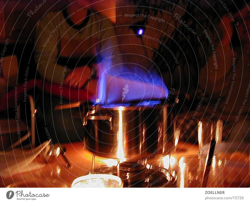 fiery Sugar Party Wine Flame Mulled wine High-grade steel Pot Cooking Cozy Hot drink Accessible Winter mood Interior shot Bluish Sugar loaf Feuerzangenbowle