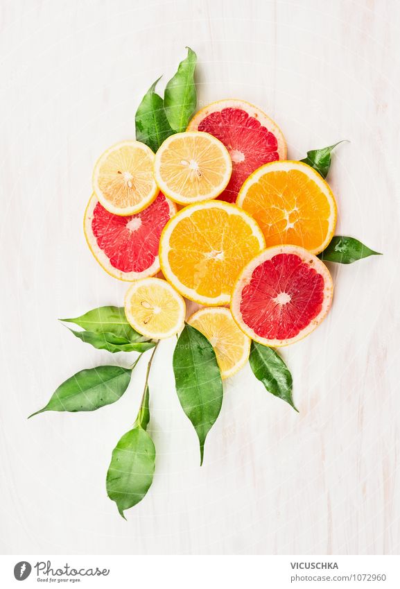 Oranges, Zintone and Grapefruit cut into slices Food Fruit Dessert Nutrition Style Design Healthy Eating Athletic Fitness Life Table Kitchen Nature Yellow
