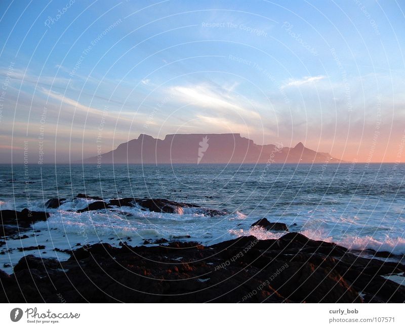 Table Mountain in Cape Town Clouds Reef Table mountain South Africa Sunset Fresh Vantage point Beach Coast Sky Rock Dusk Water Far-off places Island