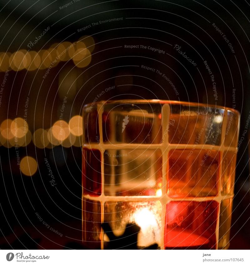 Dreaming and hoping Candle Light Hope Dark Visual spectacle Red Yellow Black Point of light Tea warmer candle Emotions Christmas & Advent Warmth Orange
