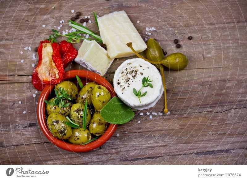 Cheese and olives Olive Olive oil camembert Parmesan soft cheese Goat`s cheese Rosemary Caper Appetizer Dessert Antipasti pickled Green Tomato Herbs and spices
