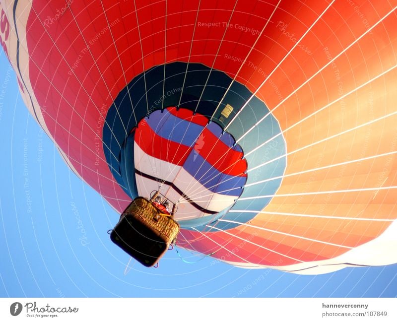 The red balloon Zeppelin Clouds Weightlessness Red Basket Glide Glider flight Hover Ease Ascending Gale Evening sun Contentment Leisure and hobbies Aviation Sky
