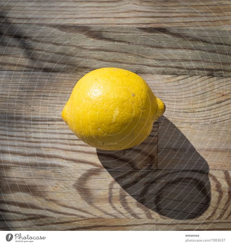 lemon Food Fruit Nutrition Organic produce Vegetarian diet Diet Juice Healthy Wellness Fragrance Table Kitchen Wood Glittering Round Sour Brown Yellow Lemon