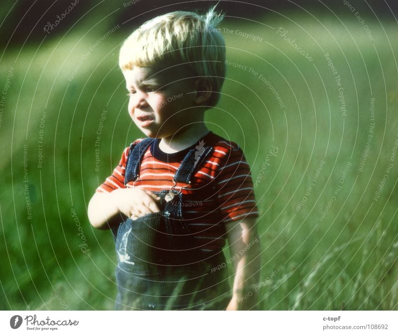 Child on a green meadow Masculine Toddler Boy (child) Body Head 1 Human being 1 - 3 years To enjoy Smiling Emotions Moody Joy Happy Happiness Contentment