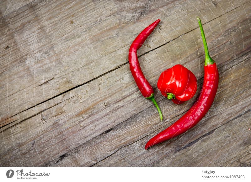 chili Chili habanero Pepper Red Herbs and spices Fire Fresh Tangy Spicy Fiery Barbecue (event) Kitchen Mexico Exotic Background picture Wood Table Wooden table