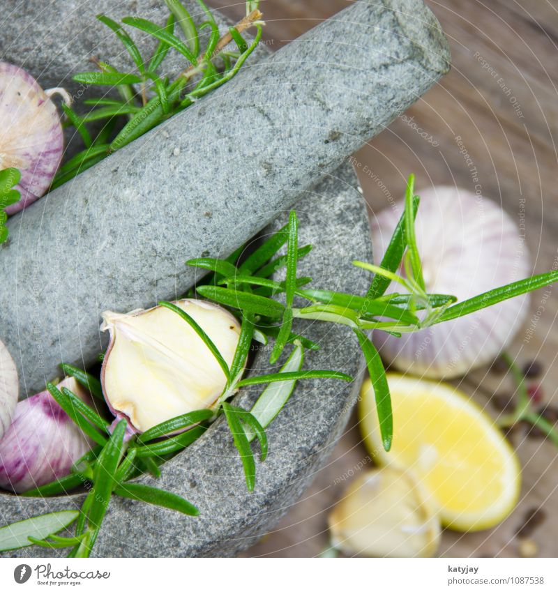Herbs in a mortar Garlic Clove of garlic Rosemary Mortar Cooking Lemon Aromatic Food Healthy Eating Dish Food photograph Fresh Herbs and spices Green Pepper