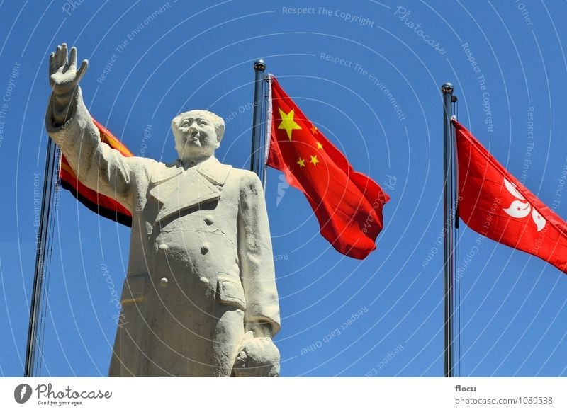 Chairman Mao Zedong with Chinese flag Hand Sky Flag Historic Blue Red Politics and state chairman China chinese Communism Communist famous Leader president