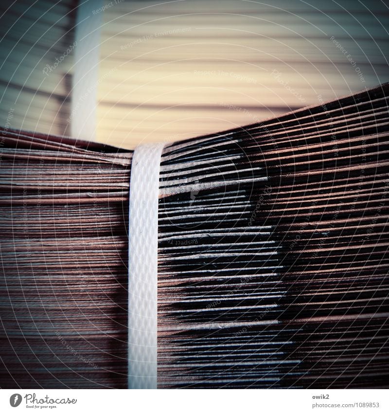 overpressure Paper Advertising Industry Brochure Newspaper Stack Bound String Plastic Lie Wait Colour photo Subdued colour Close-up Detail Abstract Pattern
