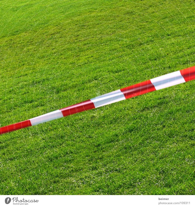 No gambling Lawn Grass surface Barrier String Green Meadow Sporting grounds Striped Red White Diagonal Background picture