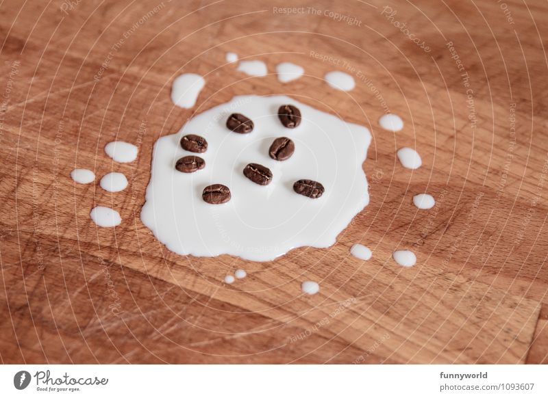 Coffee with milk, the first Food Hot drink Latte macchiato Café au lait Milk Whimsical Coffee bean Drop Wooden board Wooden table Funny Humor Exceptional